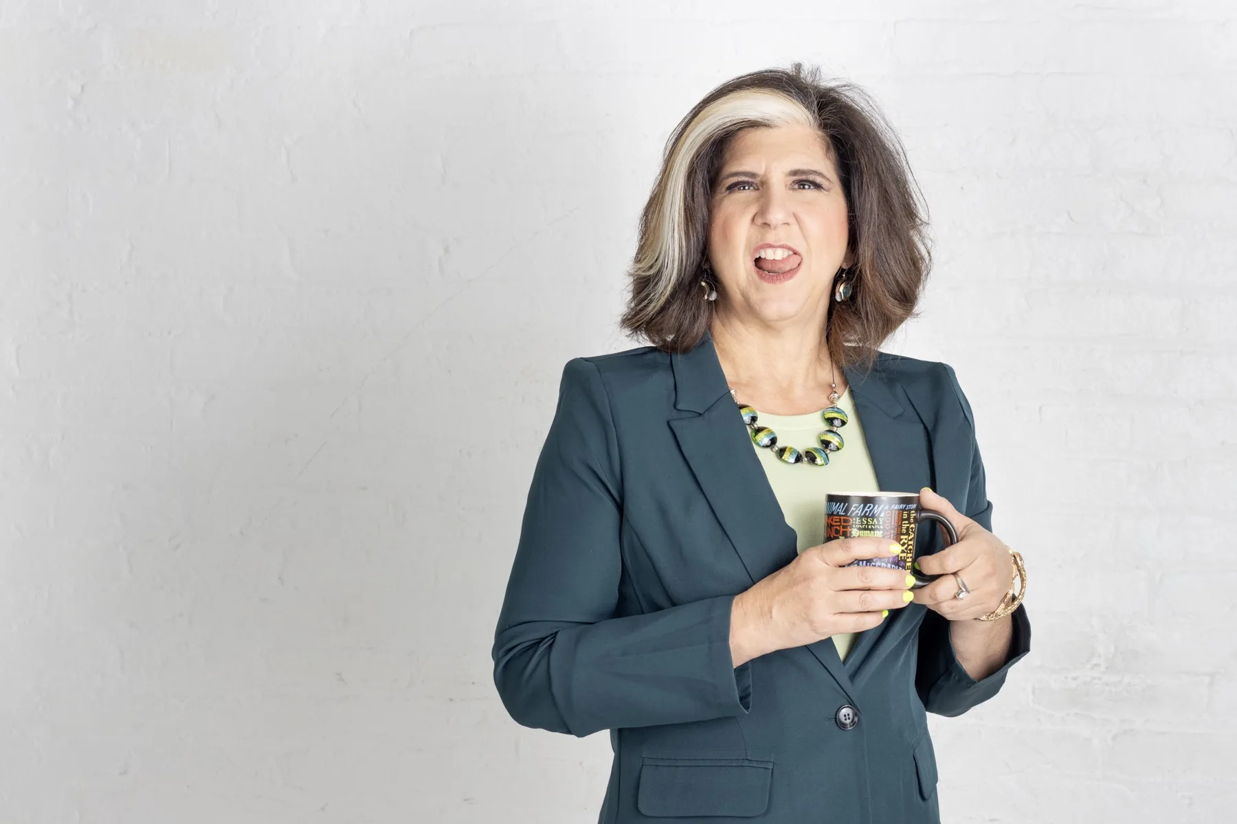 Robin Colucci mid-story with a comedic expression